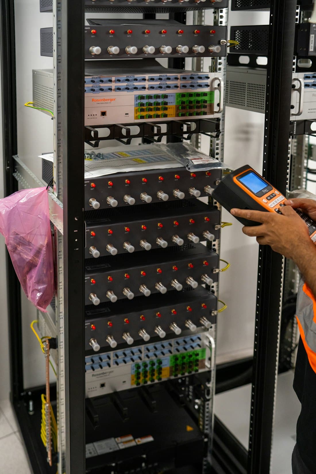 Technician testing a server rack